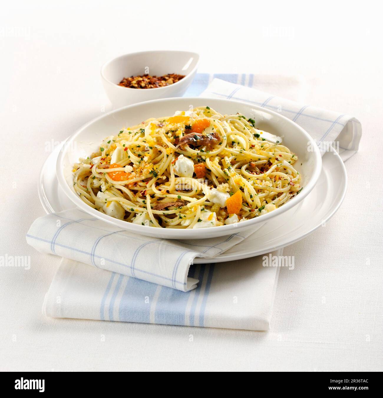 Spaghetti all'acciuga (Italian pasta with anchovies) Stock Photo
