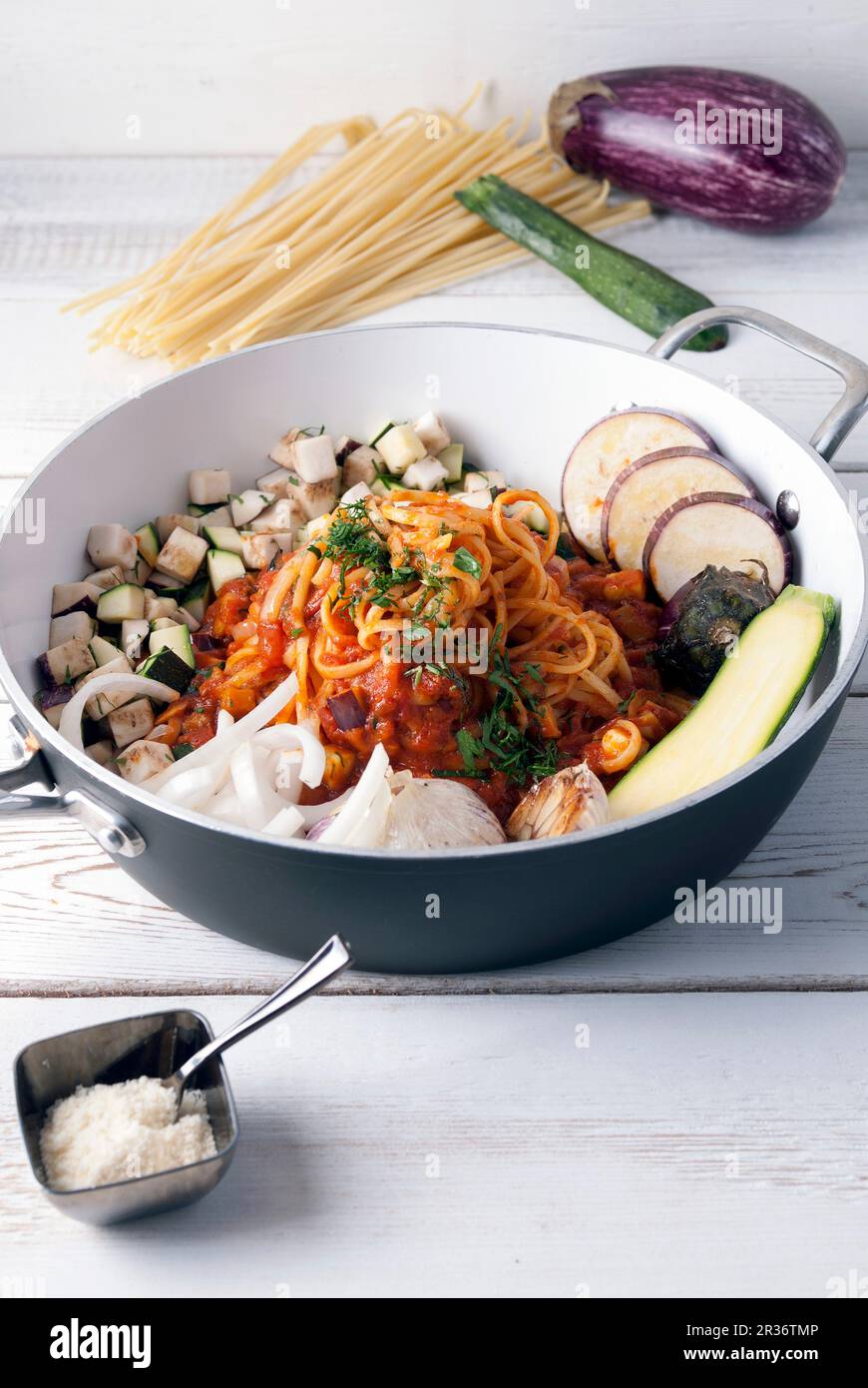 Onepot pasta with aubergine, courgette, garlic and Parmesan Stock