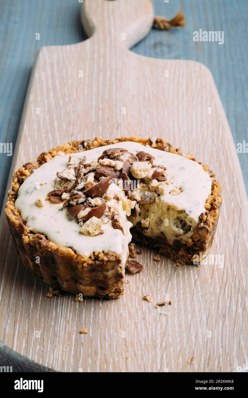 A biscuit pie with malted milk, caramel, ice cream and Maltesers Stock