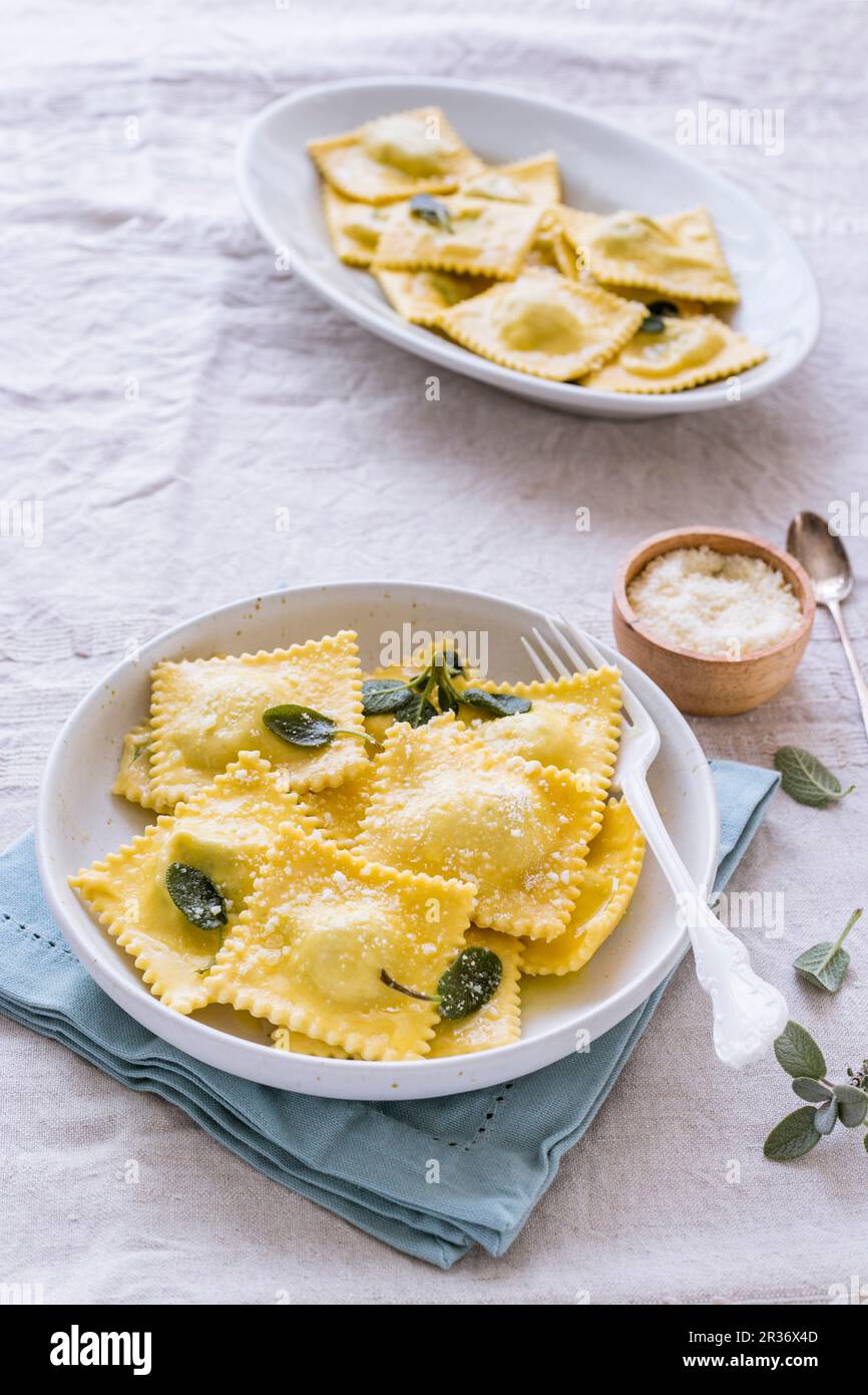 Perin Ricotta Raviole Ravioli with ricotta, sage and grated Parmesan Stock Photo - Alamy