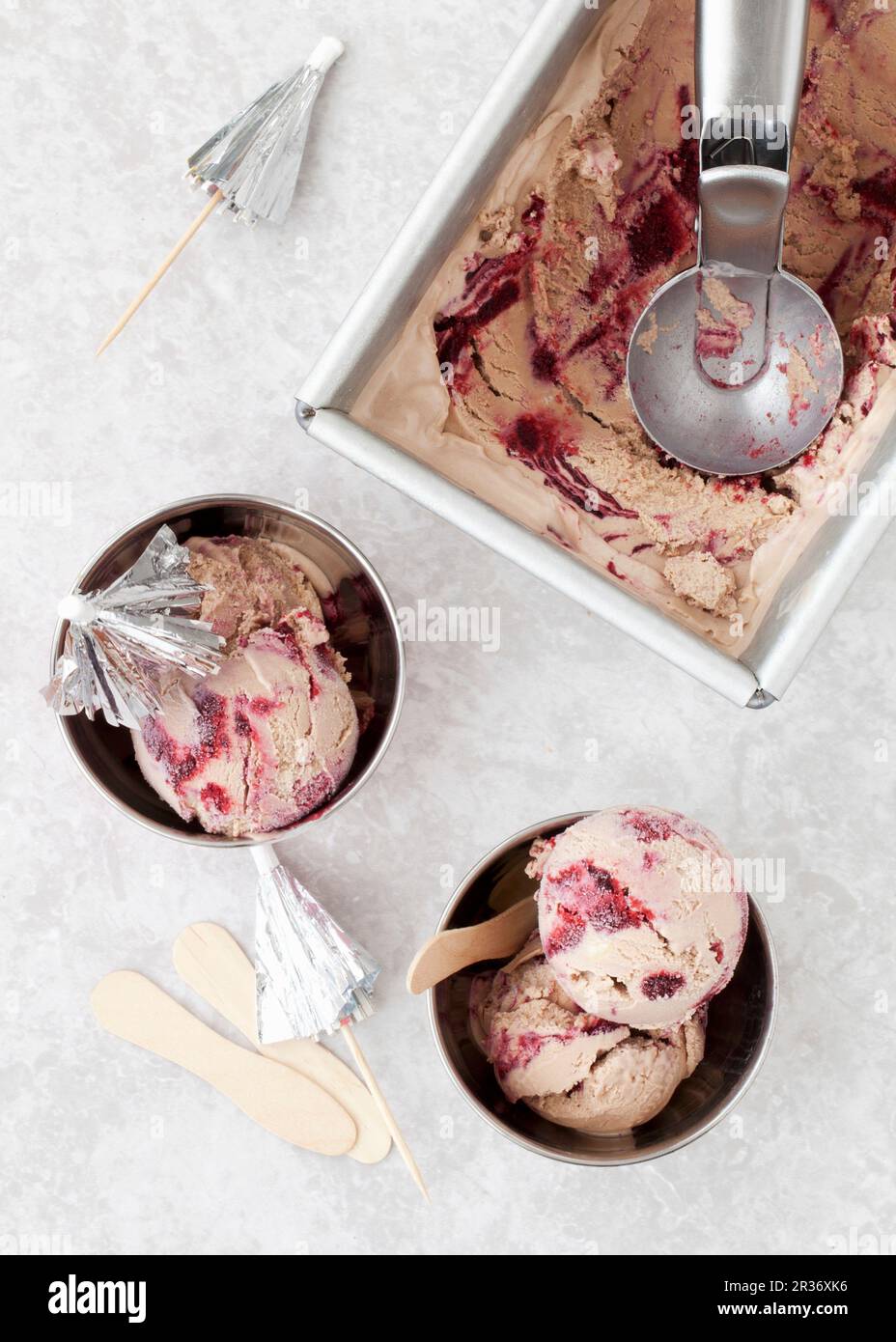 Milk chocolate and blackberry ripple ice cream Stock Photo - Alamy