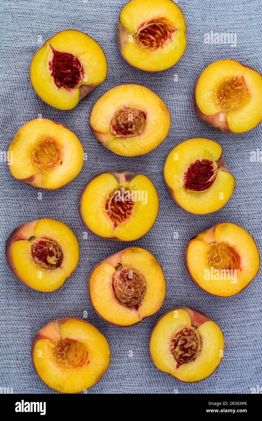 Several nectarine halves (seen from above) Stock Photo