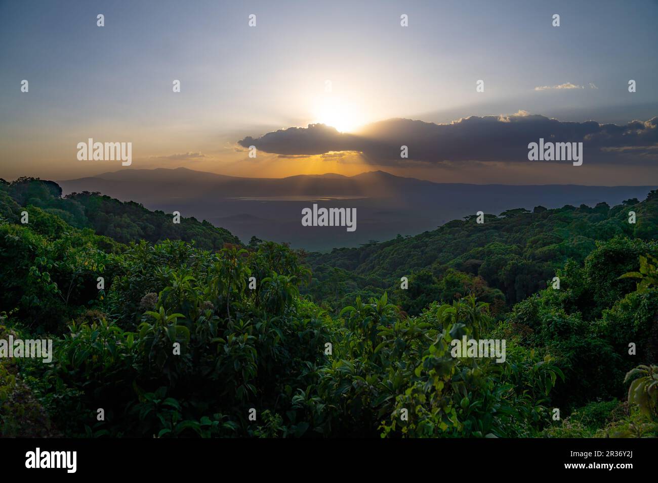 Sunset over the west rim of the Ngorongoro Crater, Ngorongoro Conservation Area, Tanzania, East Africa Stock Photo