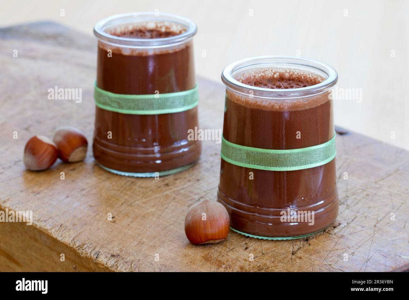 Chocolate and hazelnut flan in glasses Stock Photo