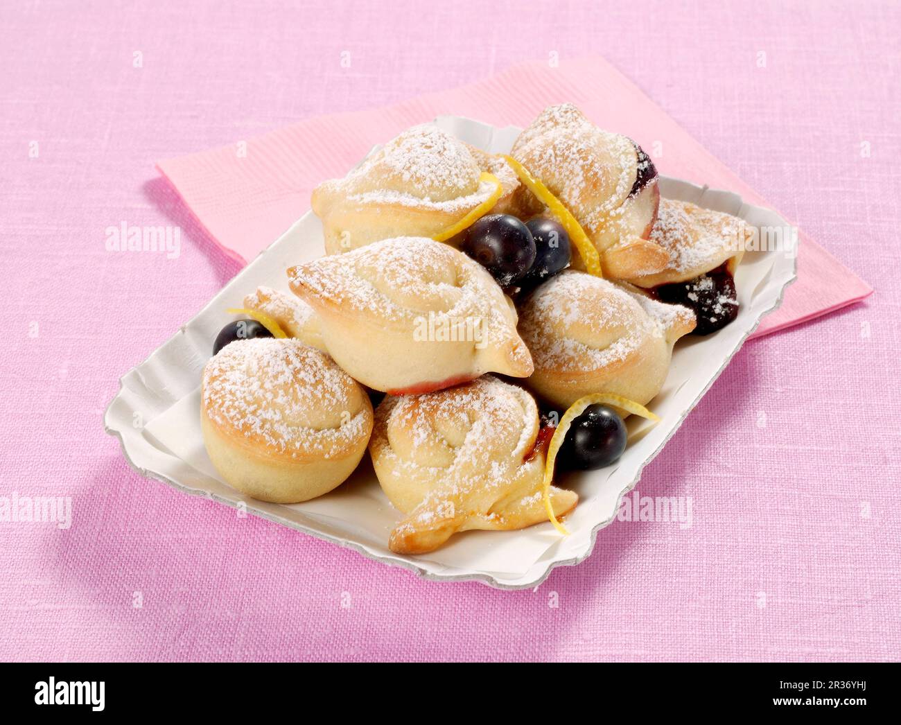 Sweet bread dough tortelli with jam and blueberries (Italy) Stock Photo
