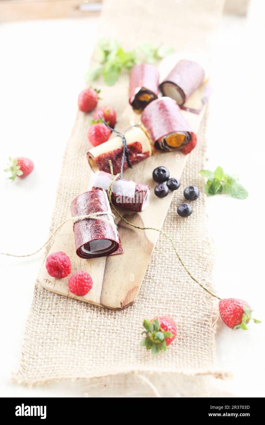 Vegan fruit roll-ups with fresh berries Stock Photo - Alamy