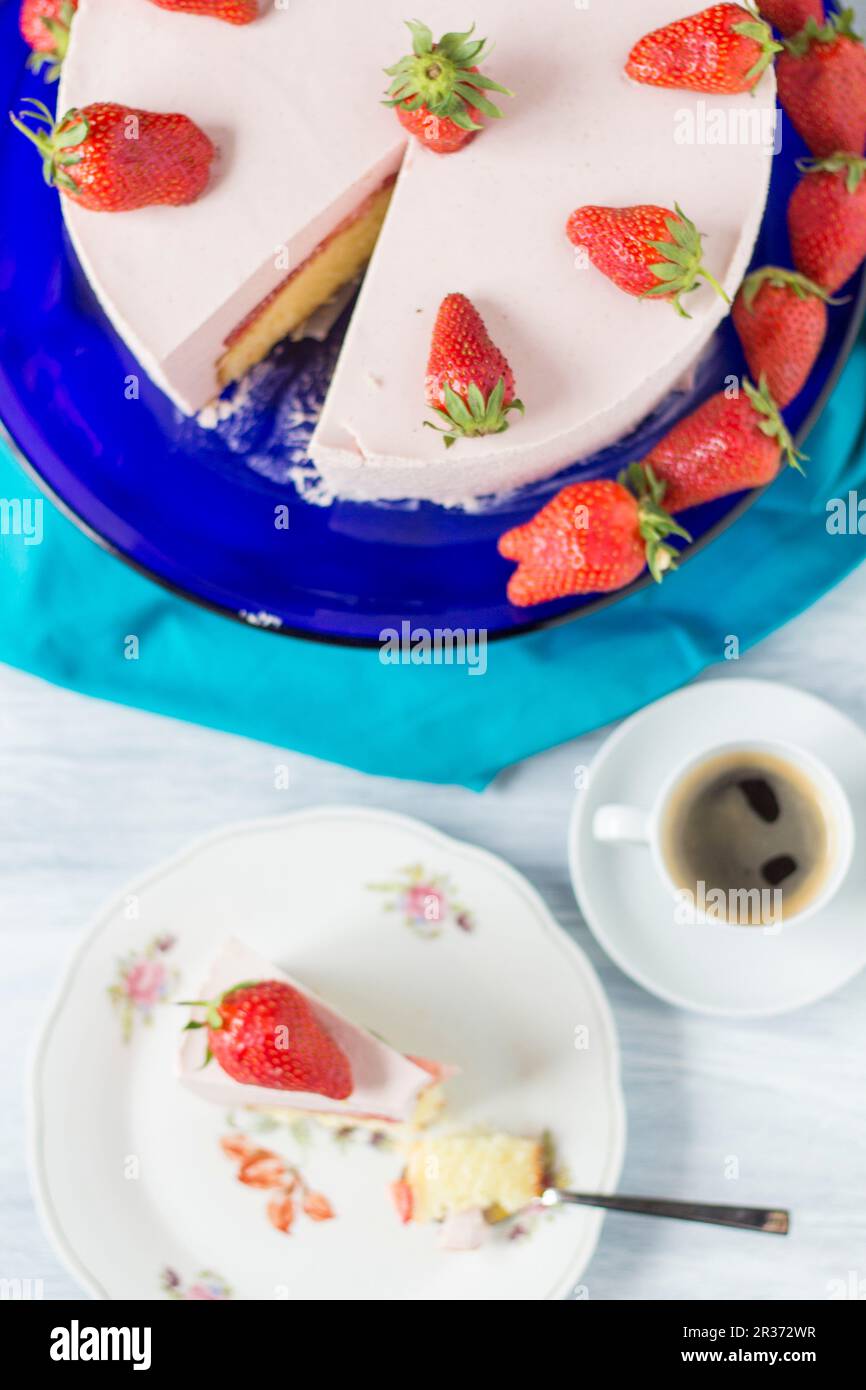 Strawberry yoghurt cake, pieces removed Stock Photo Alamy
