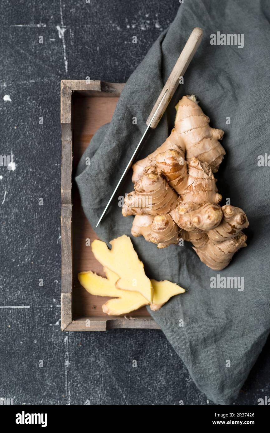 Ginger root, whole and peeled Stock Photo Alamy