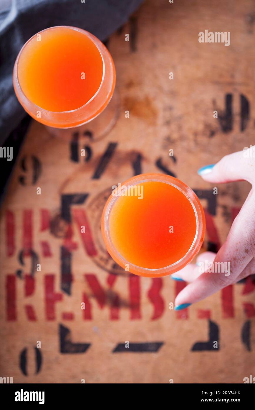 Monkey Gland cocktails (gin, orange juice, grenadine and absinthe Stock