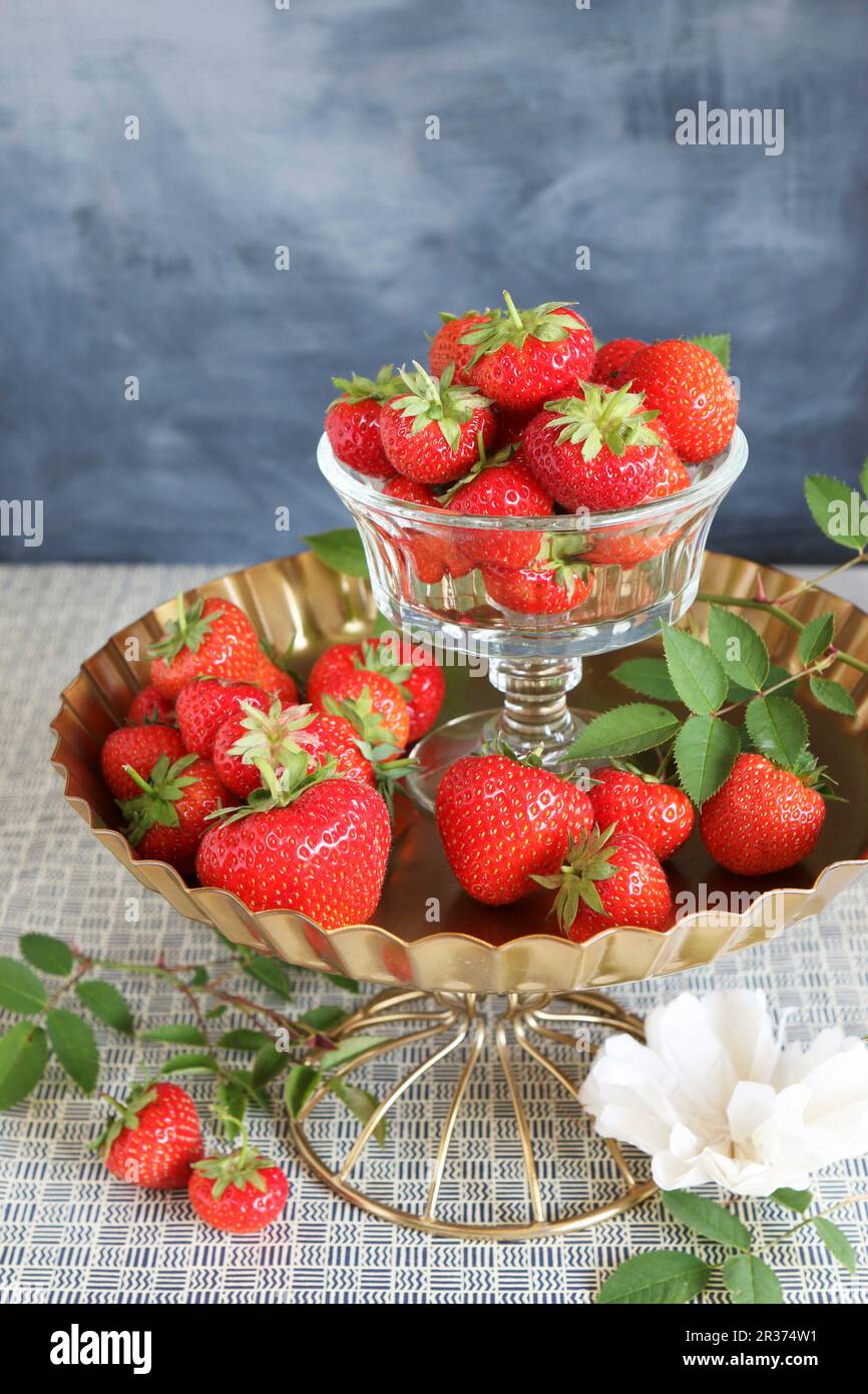Strawberries in a glass stand hi-res stock photography and images - Alamy