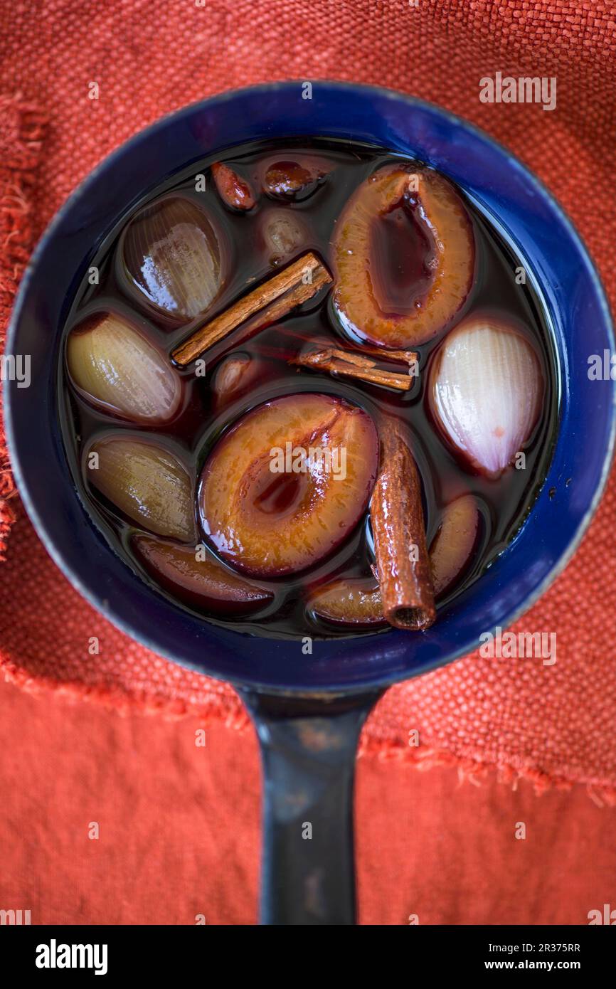 Plum sauce with onions and cinnamon Stock Photo