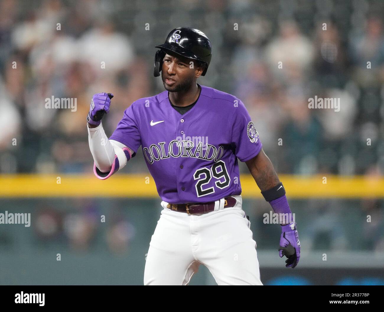 Colorado Rockies' Jurickson Profar gestures to the dugout after doubling to  drive in two runs off Miami Marlins relief pitcher JT Chargois in the  seventh inning of a baseball game Monday, May