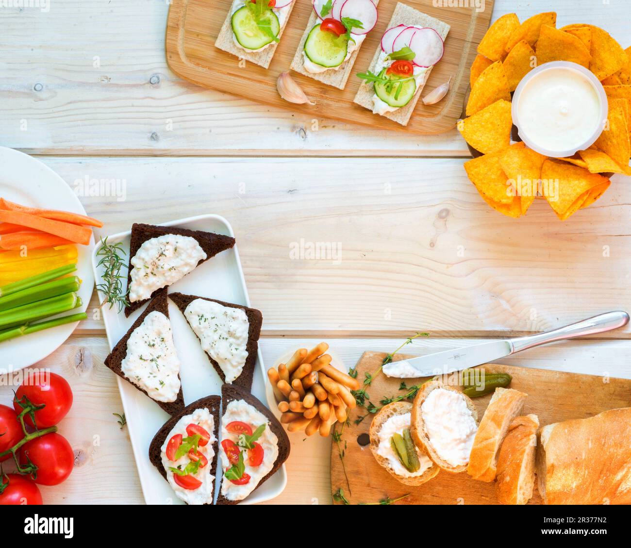 Assorted snacks on a table Stock Photo - Alamy