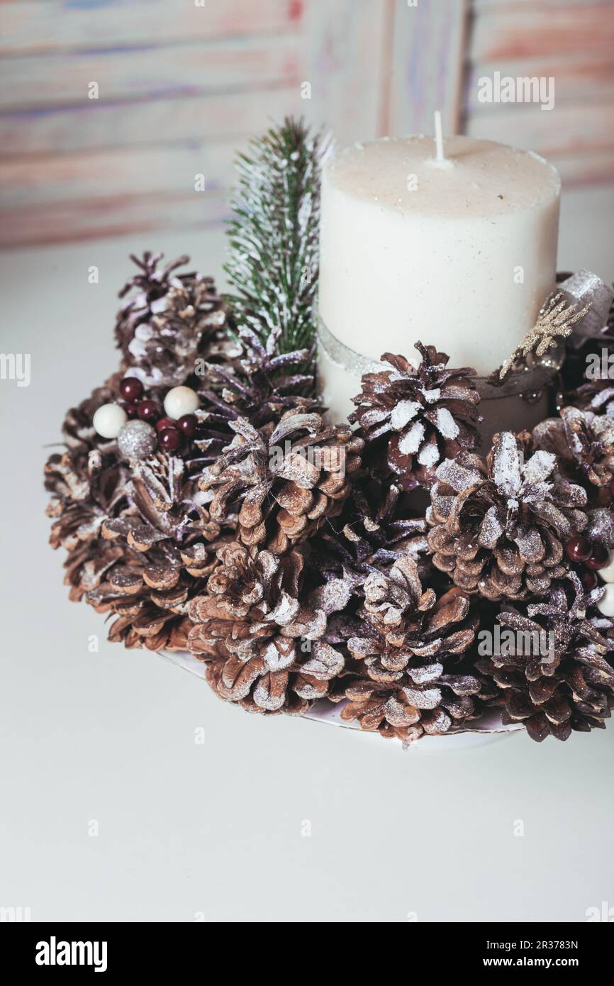 Christmas cones candlestick Stock Photo - Alamy