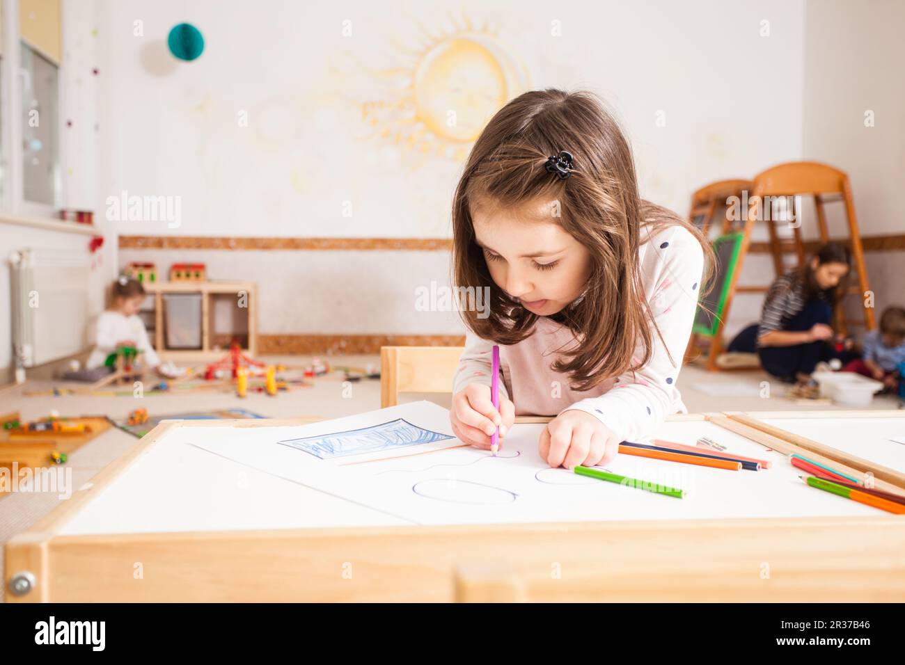 Drawing lesson in kindergarten stock photo alamy
