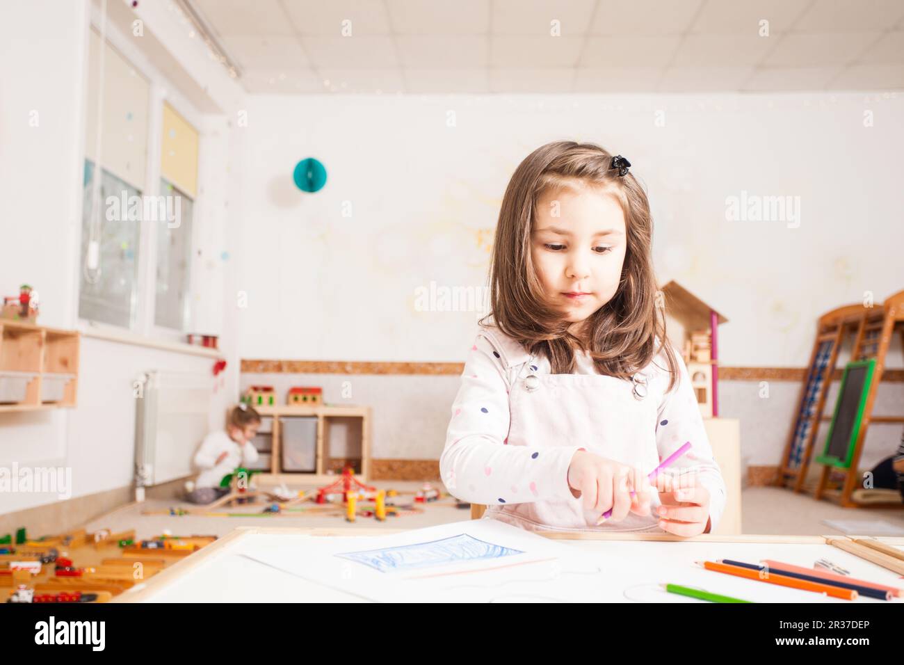 Drawing lesson in kindergarten Stock Photo Alamy