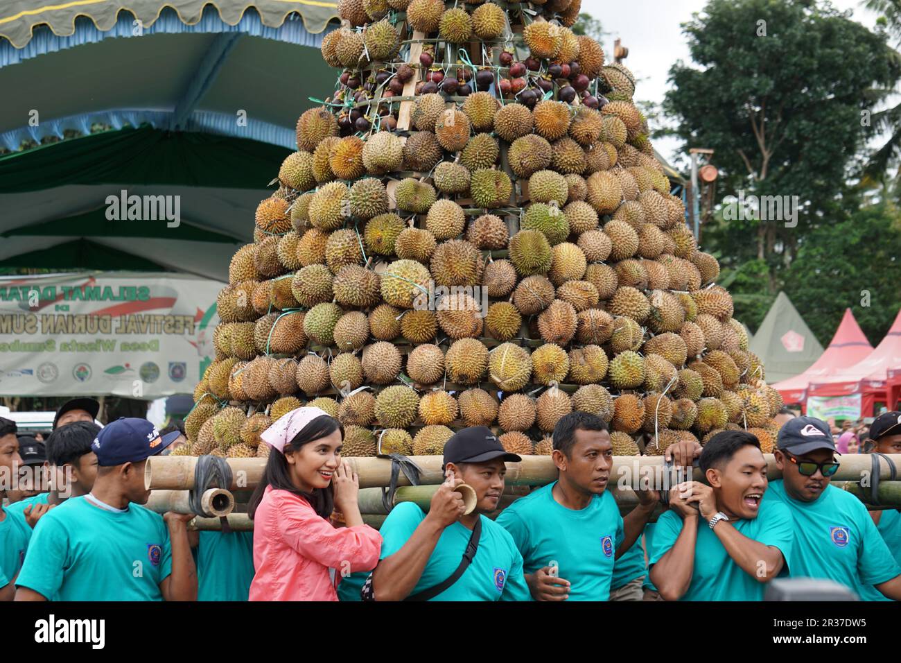 Indonesian are carrying tumpeng durian on sumberasri durian festival Stock Photo