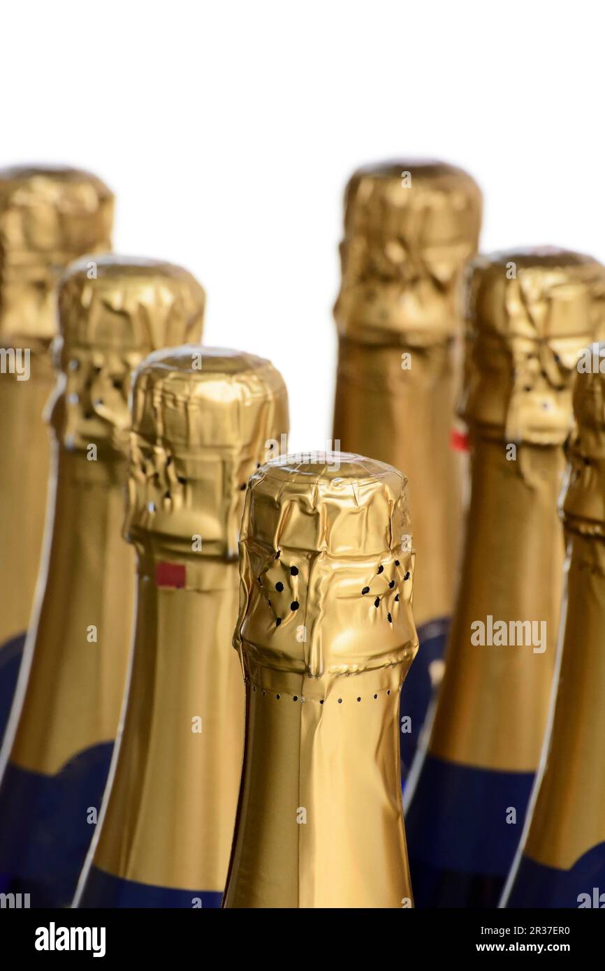 Buttle necks of sparkling wine or champagne Stock Photo - Alamy