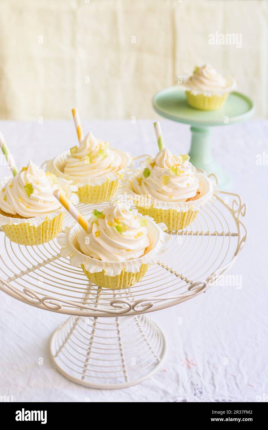 Lemon and vanilla cupcakes on a cake stand Stock Photo