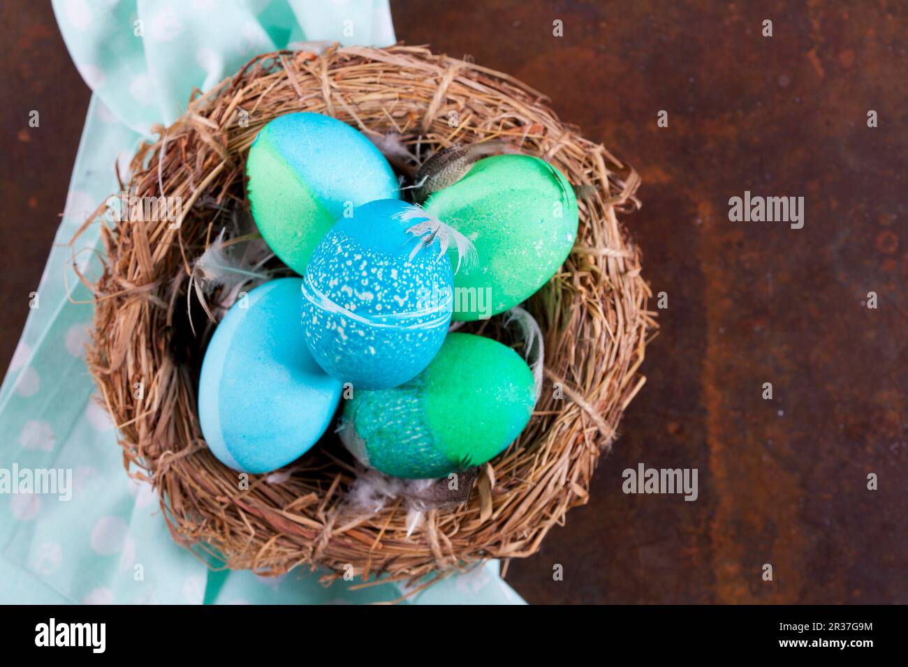 Dyed Easter eggs with batik patterns in a basket Stock Photo