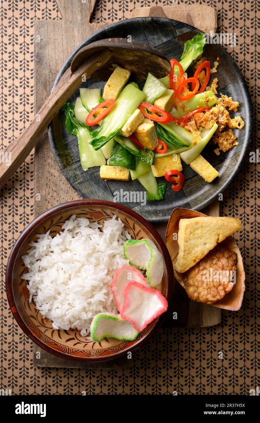 Tumis Sawi Hijau (Indonesian stirfried bok choy) served white rice