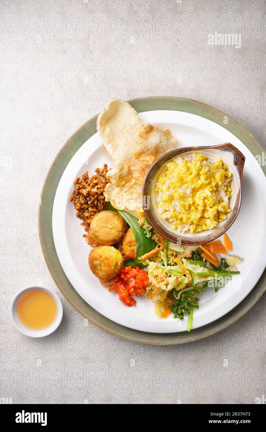 Nasi Jagung (Indonesian corn rice) with side dishes Stock Photo Alamy