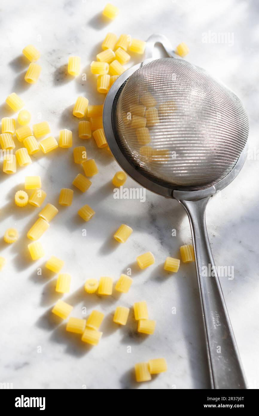 Small strainer hi-res stock photography and images - Alamy