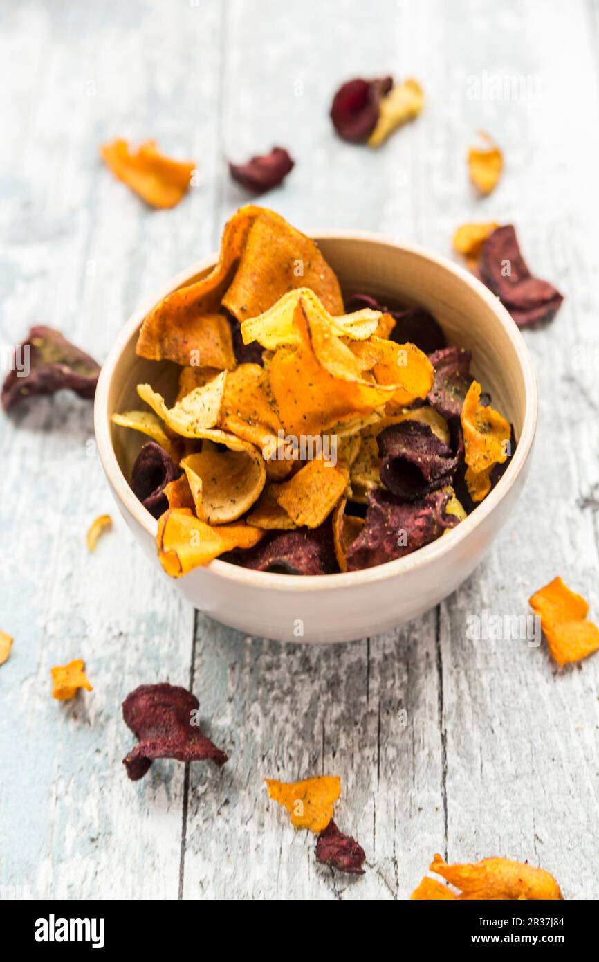 Colourful vegetable crisps in a bowl Stock Photo