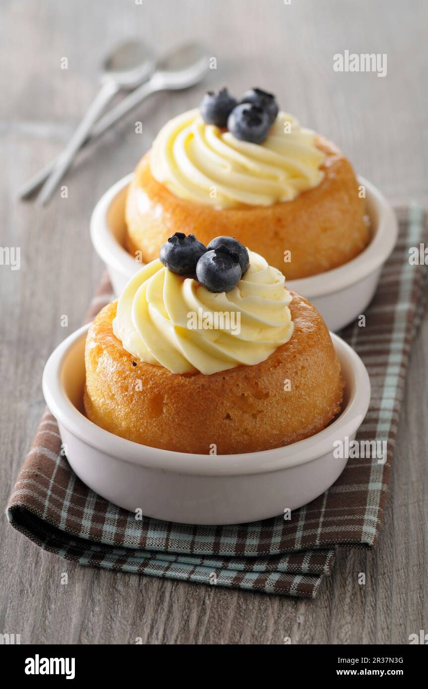 Rum baba (Rum soaked yeast cake, France Stock Photo Alamy