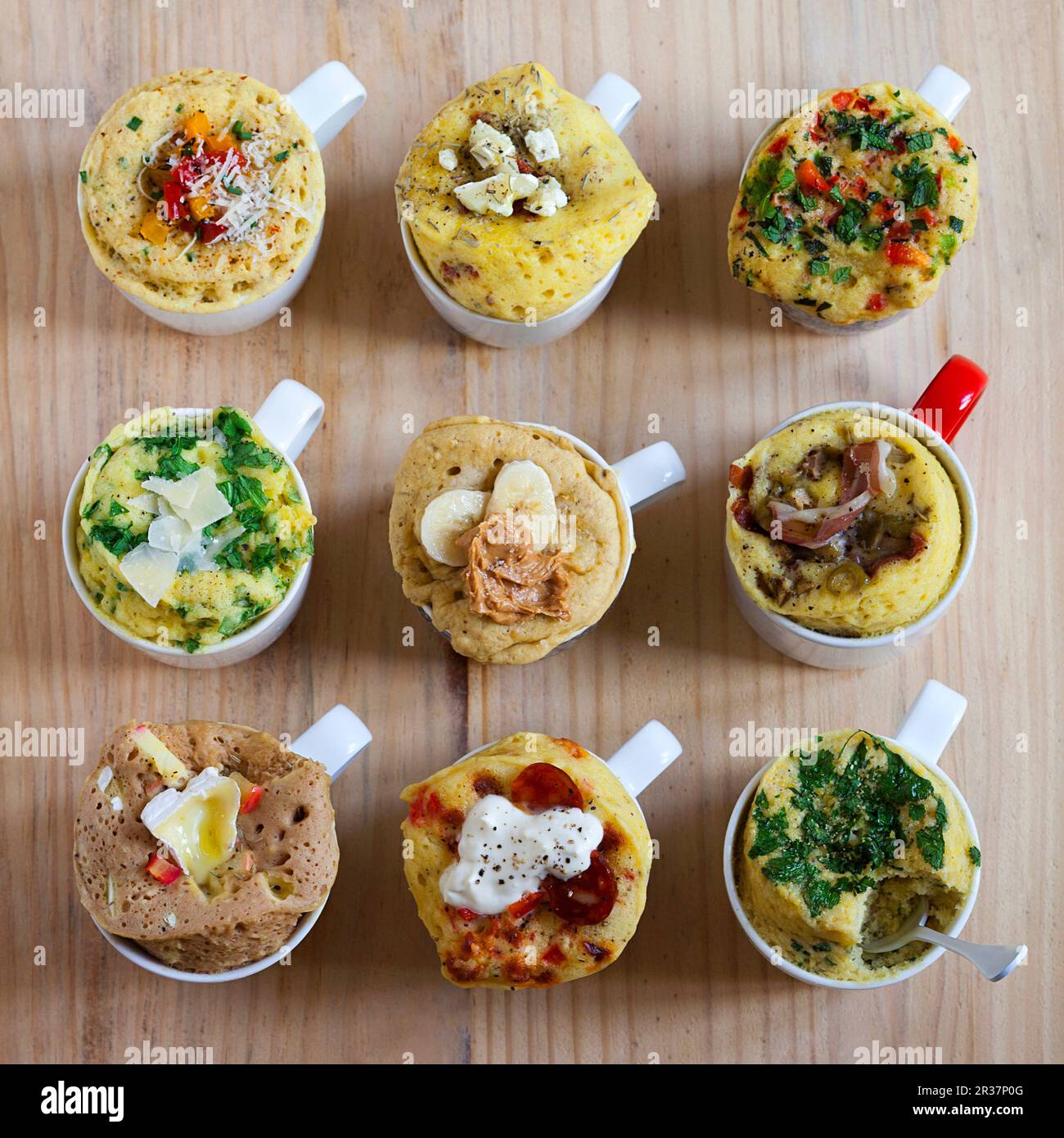 Nine different savoury mug cakes (seen from above) Stock Photo