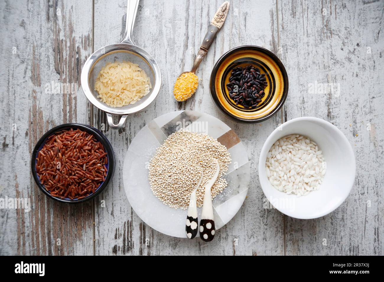 An arrangement of various types of rice, quinoa and couscous (seen from ...