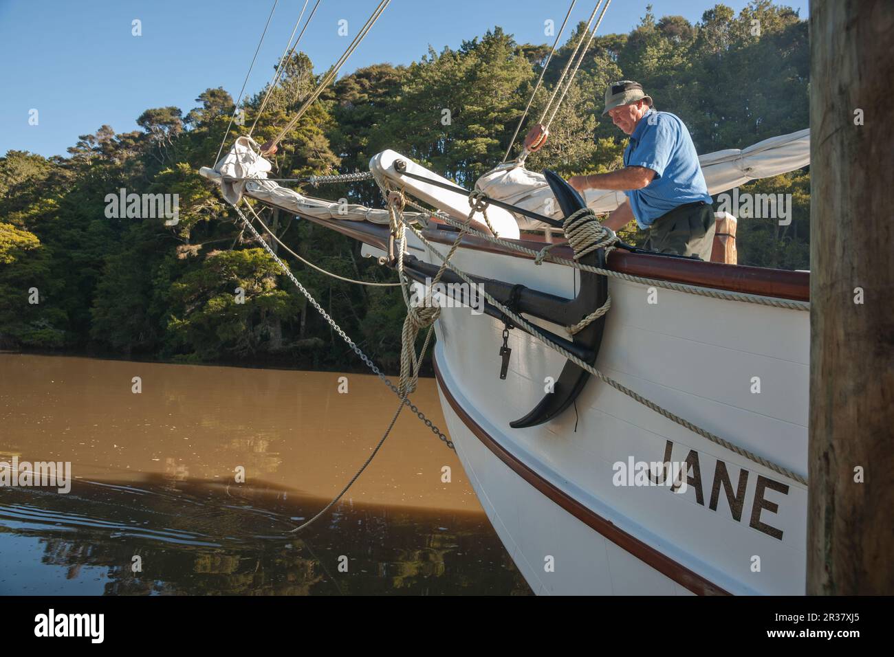 Warkworth New Zealand - March 8 2011; Editorial-old fashioned sailing boats moored alongside waterfront pier on Mahurangi River Stock Photo