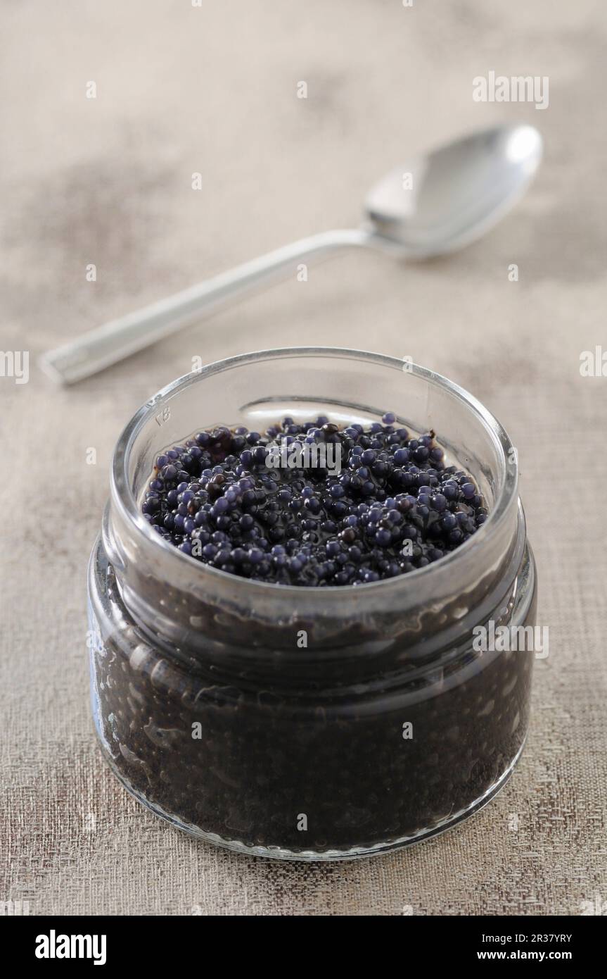 Black caviar in a glass Stock Photo