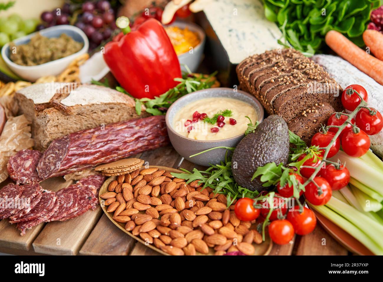 Table full of mediterranean appetizers, tapas or antipasto. Assorted ...