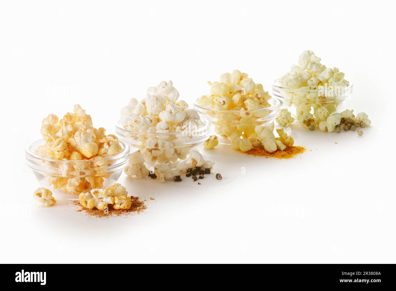 Popcorn flavoured with different spices Stock Photo Alamy