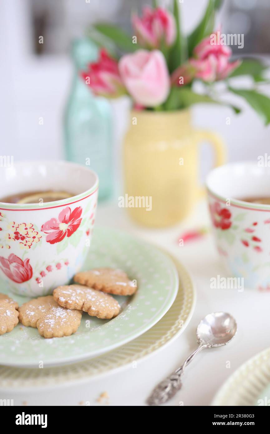 Heart shaped cookies and tea Stock Photo
