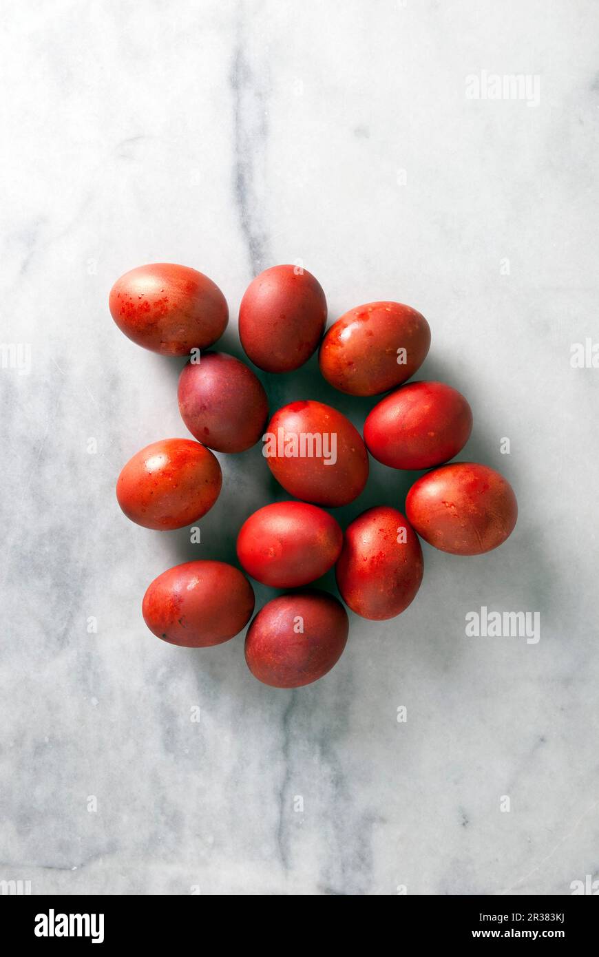 Red Greek Easter eggs on a marble background Stock Photo