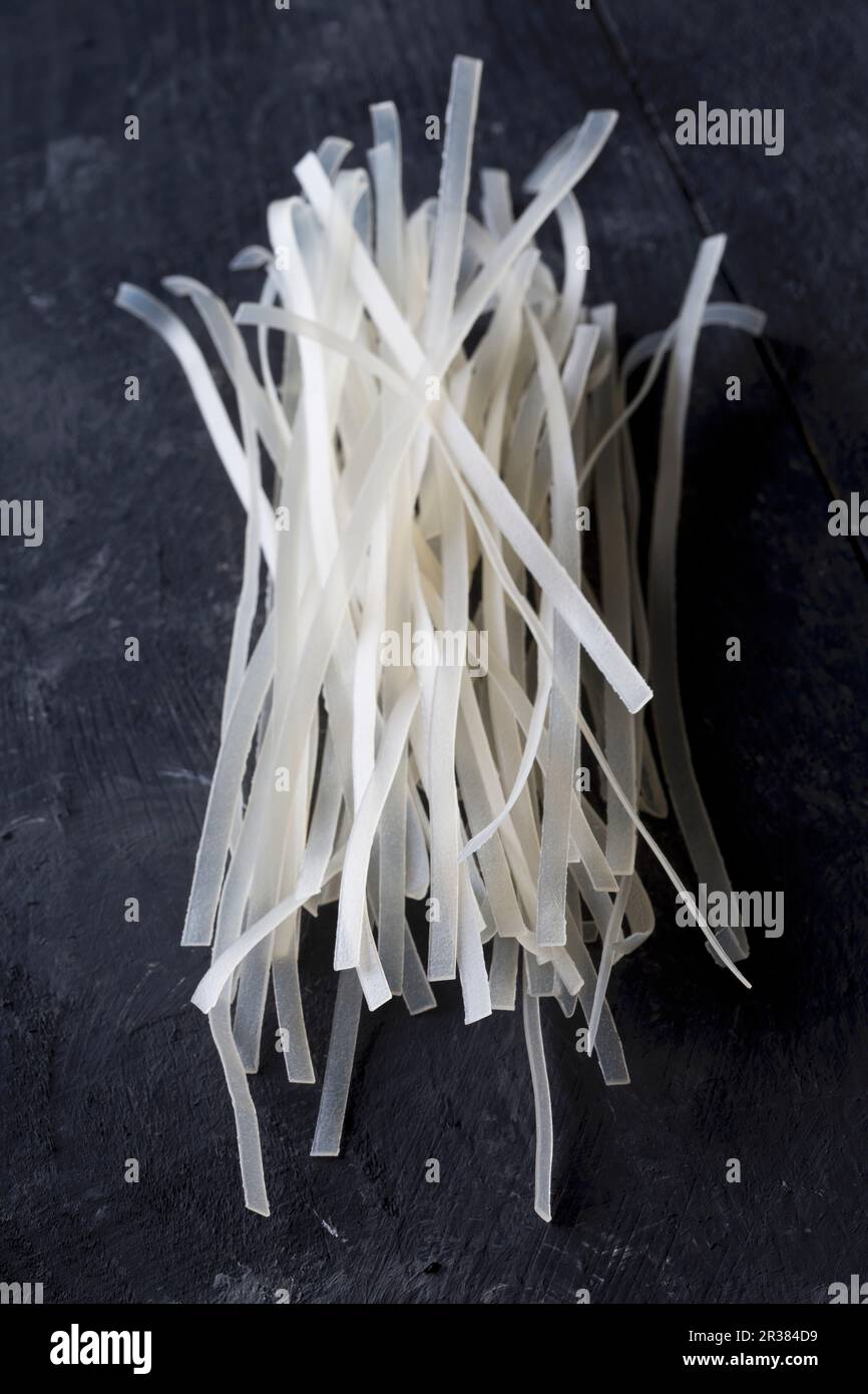 Dried glass noodles on a black background Stock Photo