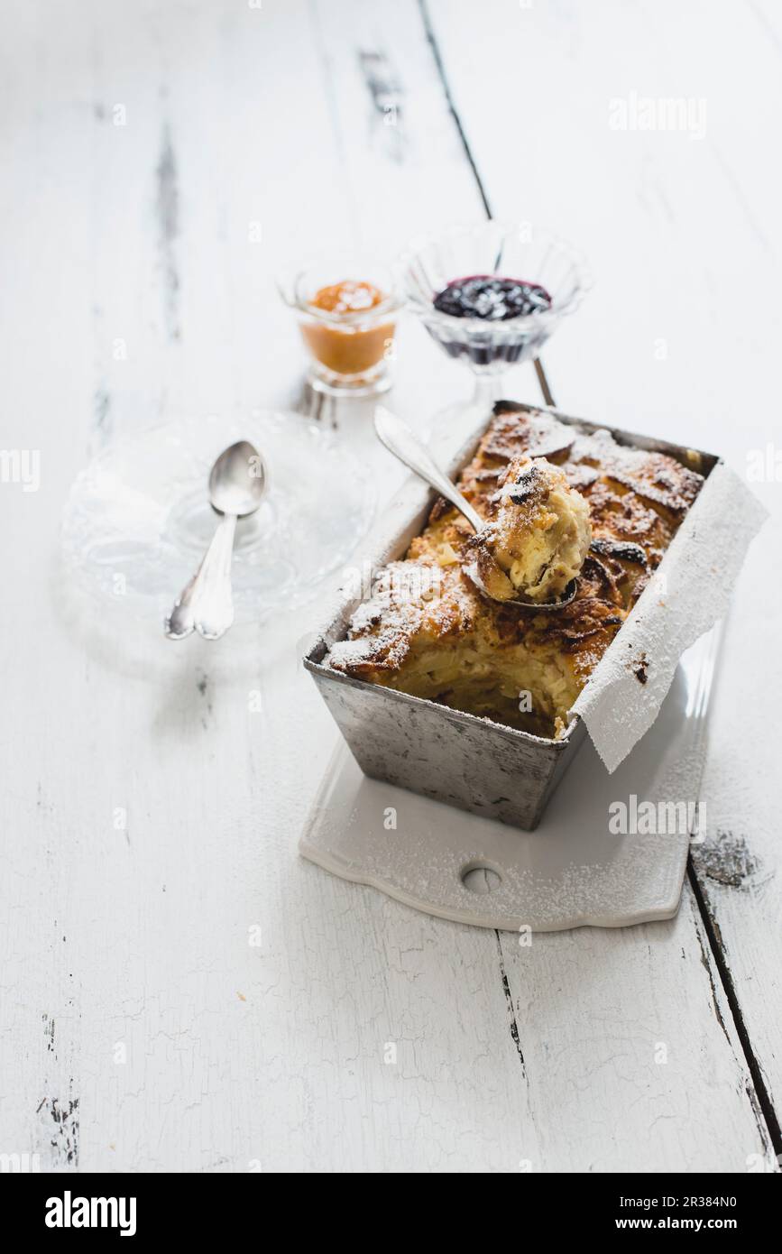 Austrian Pudding Kipfelkoch (croissant pudding, Austria) with dried apricots Stock Photo ...