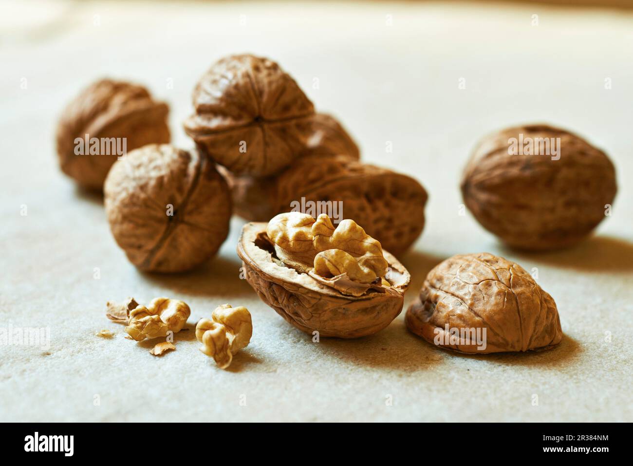 Walnuts, whole and halved Stock Photo