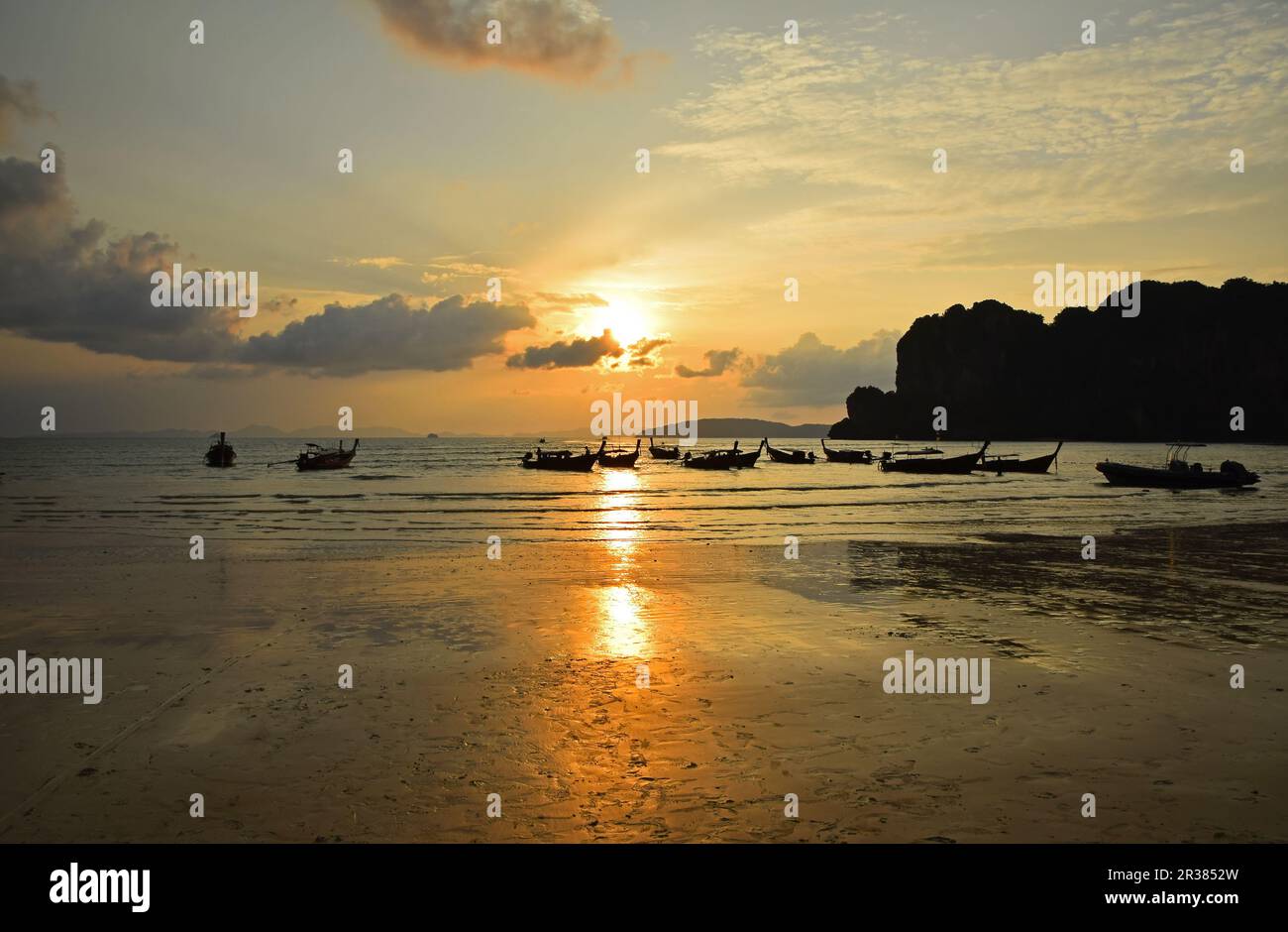 Traditional Thailand long tail boats at sunset Stock Photo