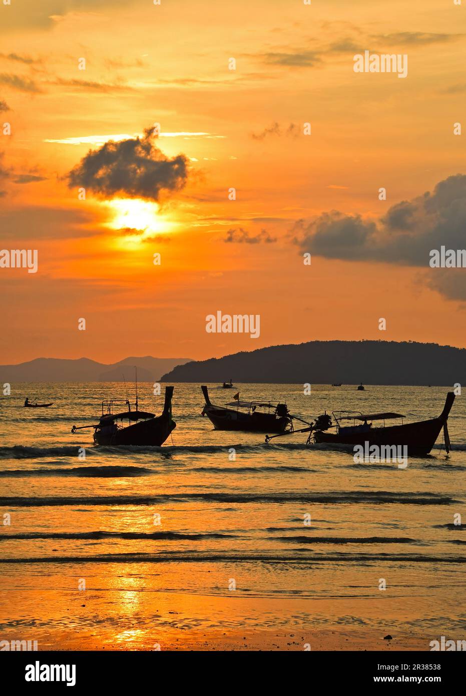Traditional Thailand long tail boats at sunset Stock Photo