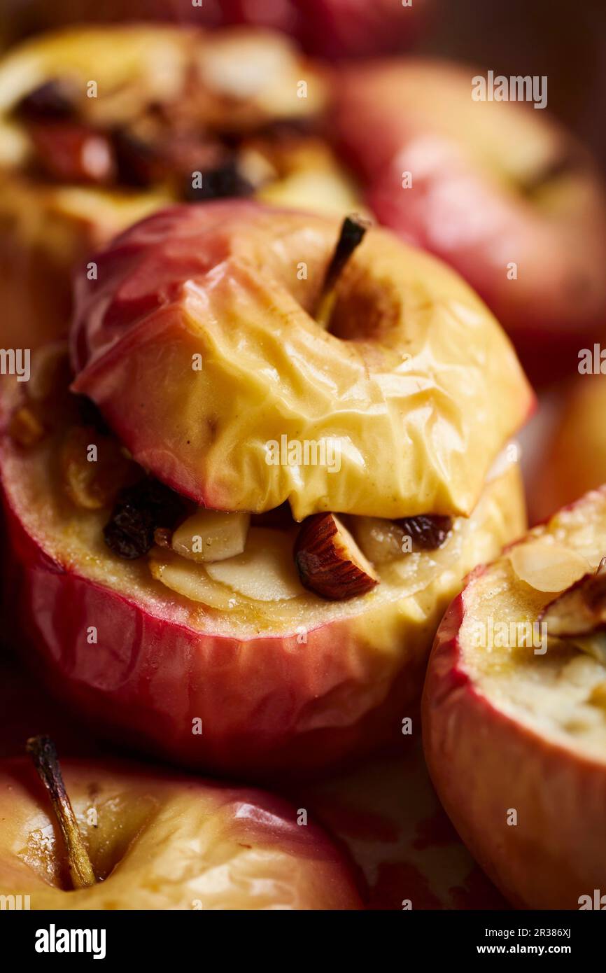Roasted apples stuffed with nuts, almonds and raisins Stock Photo Alamy