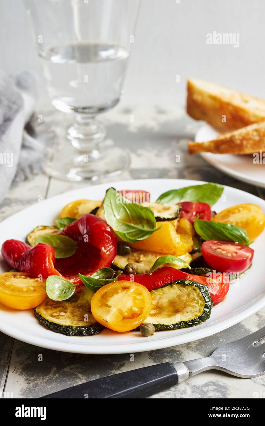 Vegetable antipasti salad with basil Stock Photo Alamy