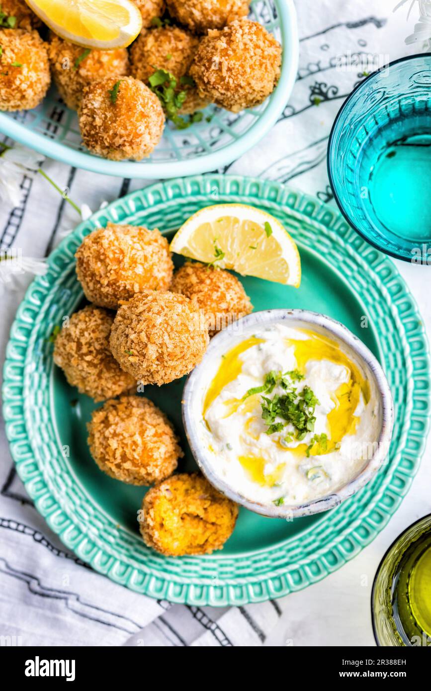 Carrot falafel with tahini yogurt dipping sauce Stock Photo Alamy