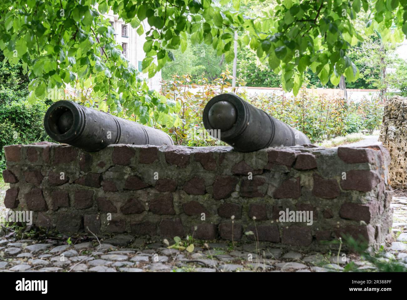 View of cannons guns on the ground of The Cathedral of St. Catherine in Kherson on May 23, 2923. During occupation Russian removed remains of Prince Potemkin and transported them to Russia Stock Photo
