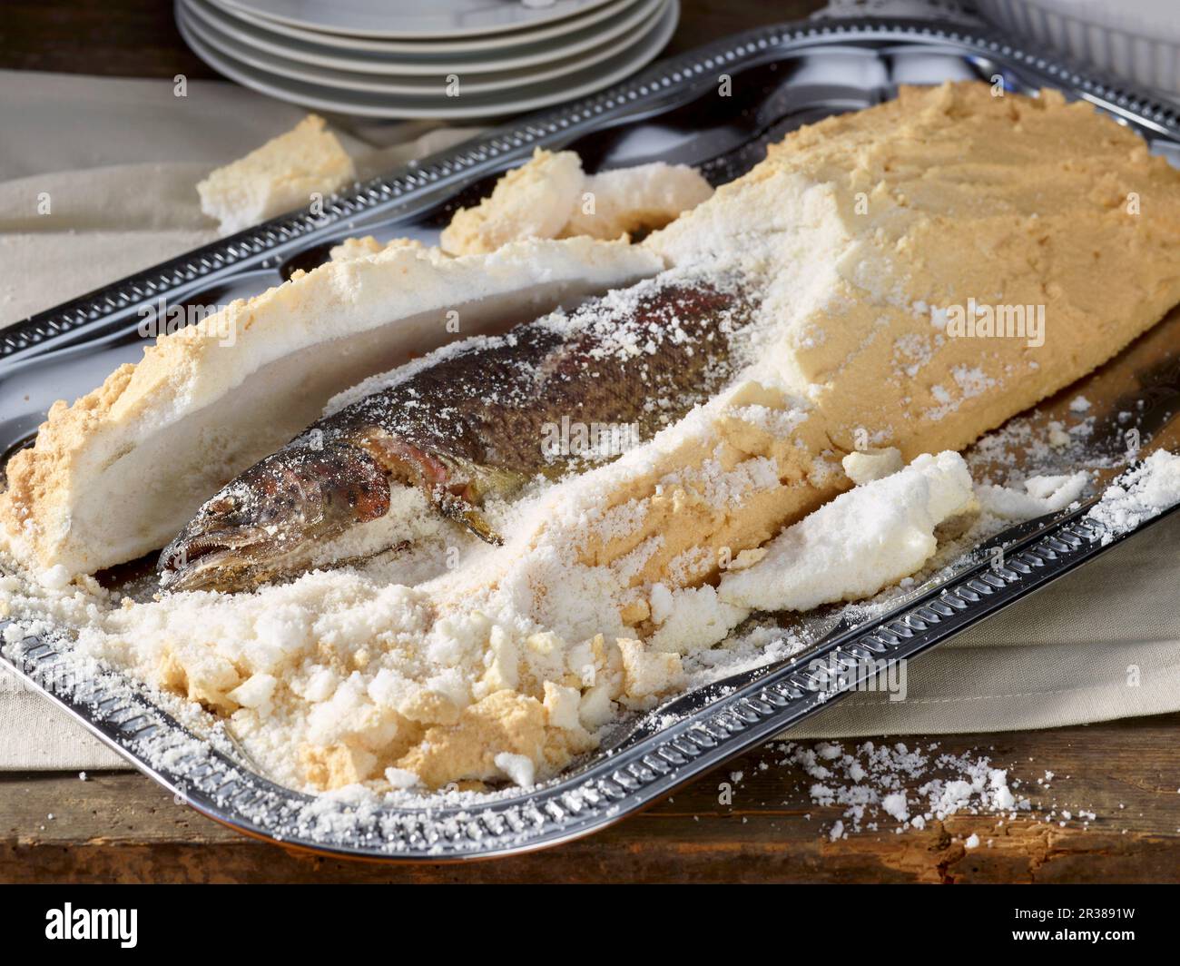 Salmon trout in salt crust Stock Photo Alamy