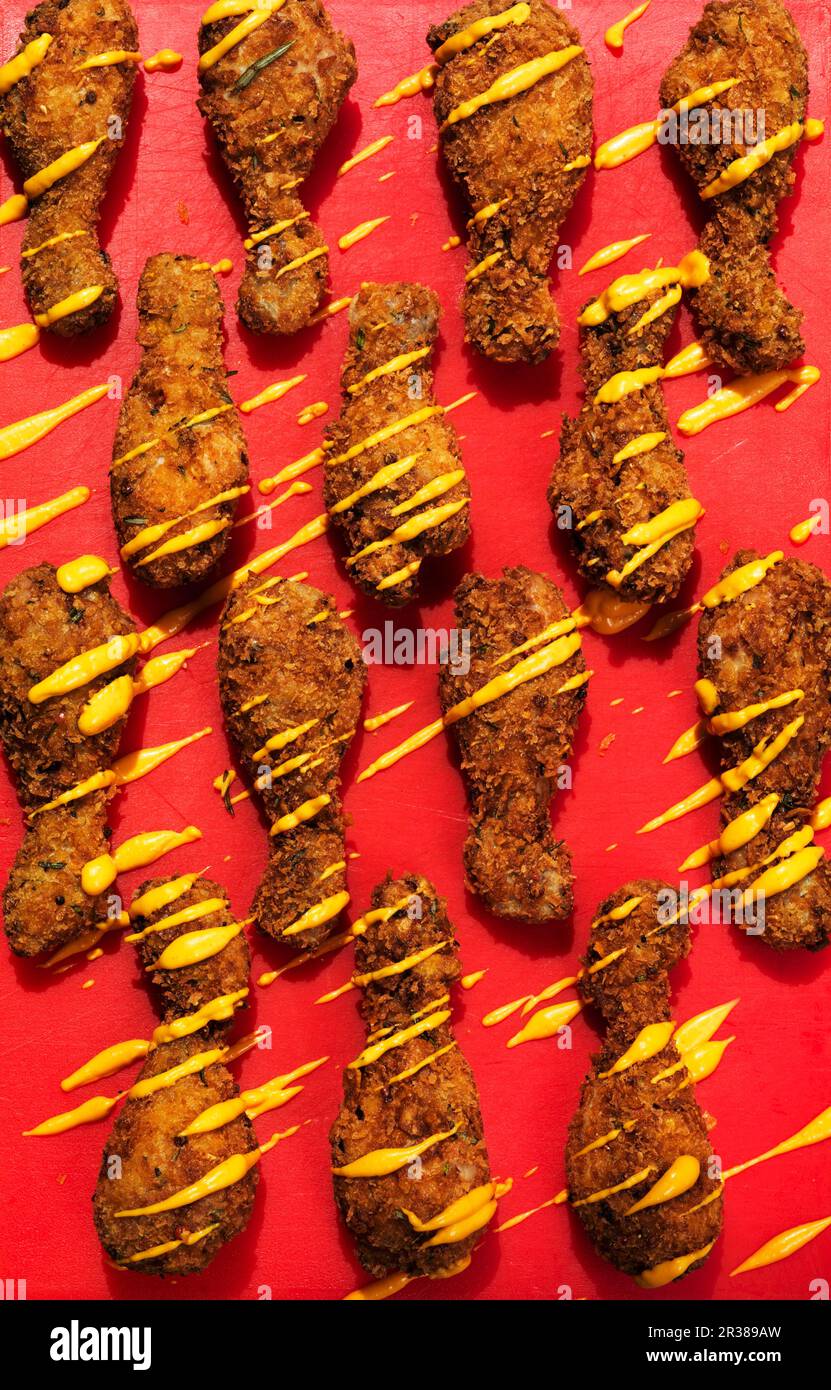 Crispy fried chicken legs with mustard Stock Photo Alamy