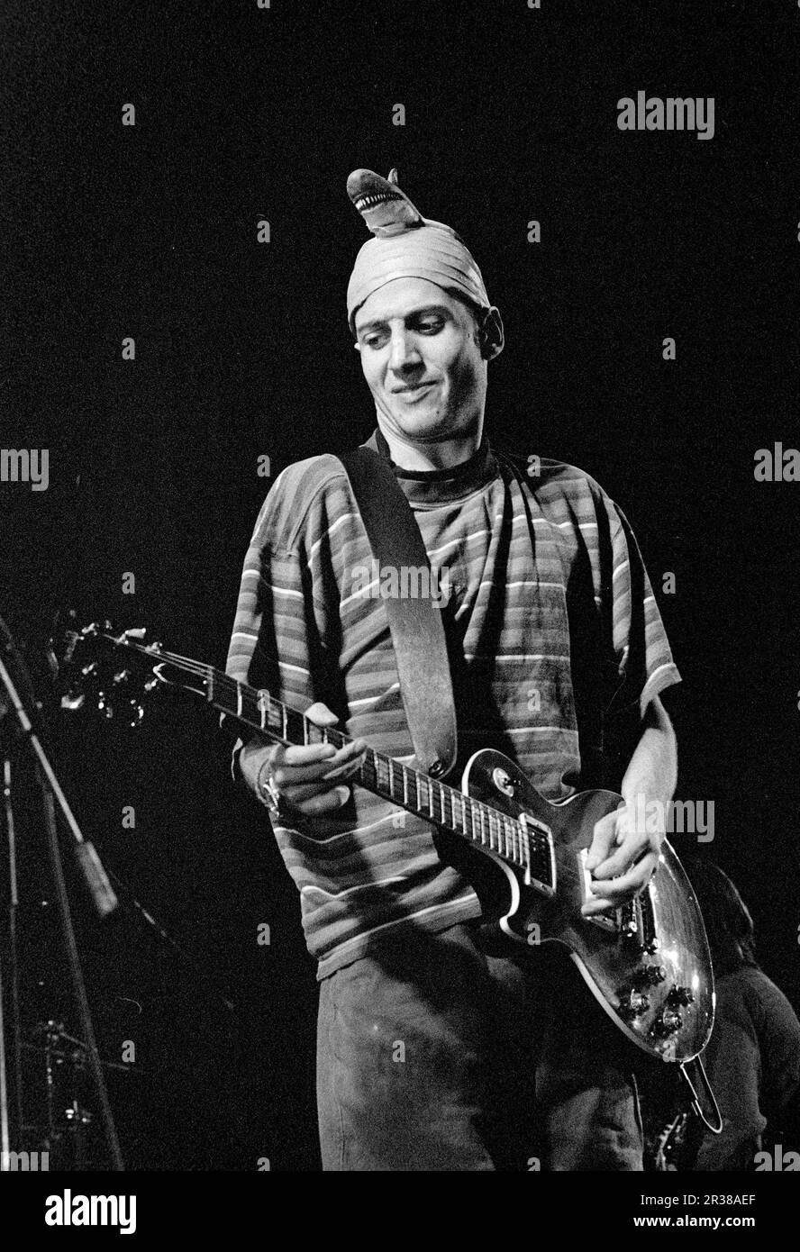 Mike McCready of the band Pearl Jam greets people on the field