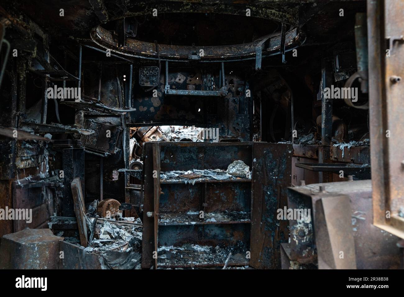 Interior of destroyed Russian military vehicle used for artillery support seen in near Kherson in Ukraine on May 22, 2023 Stock Photo
